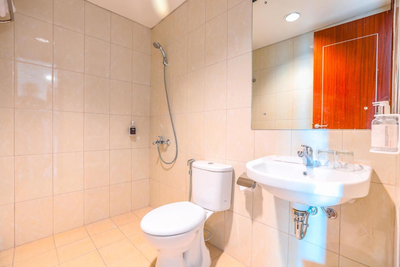 Super Oyo Collection O 16 Vittoria Residence Jakarta Buitenkant foto